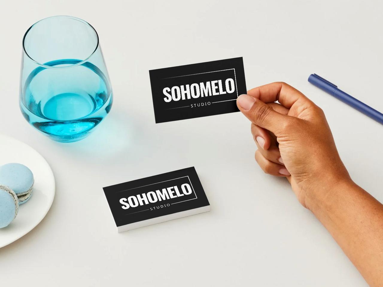 Holding a business card